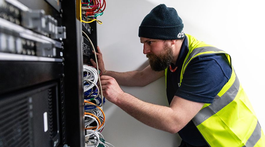 An engineer managing a broadband network, explaining what is dark fibre. 